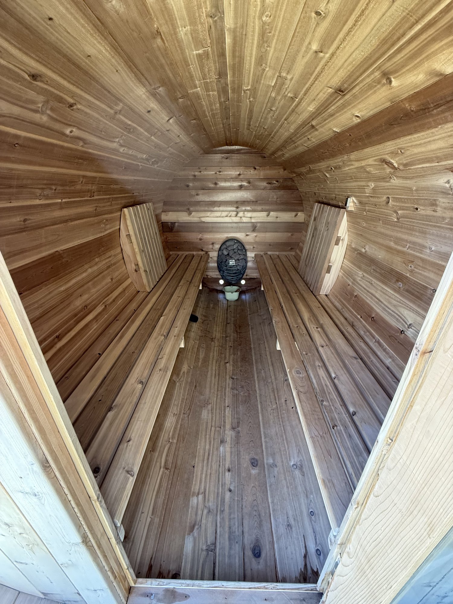 Inside the cedar barrel sauna